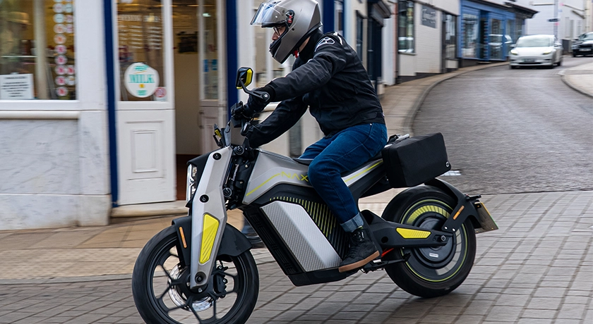 Young Man riding the Naxeon I am Pro.webp